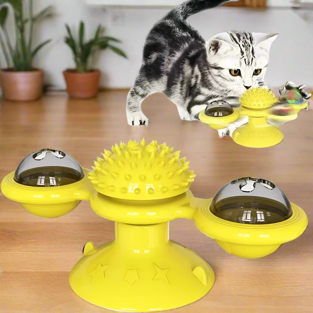 Yellow cat toy with three compartments and a cat interacting with it on a white background