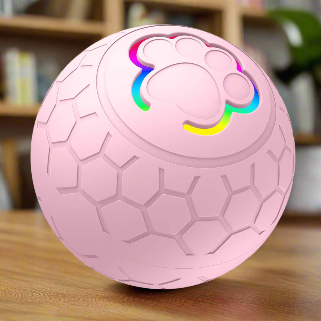 Pink textured ball with colorful design on a white background